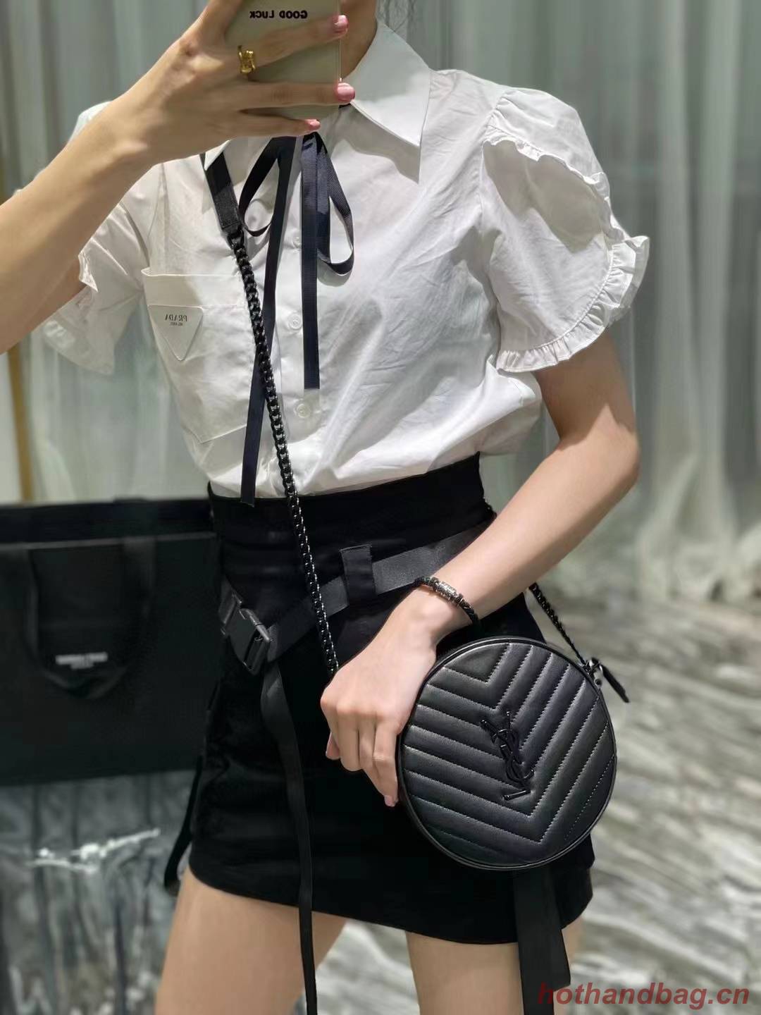 SAINT LAURENT VINYLE ROUND CAMERA BAG IN CHEVRON-QUILTED GRAIN DE POUDRE EMBOSSED LEATHER 6104361 black SAINT LAURENT VINYLE ROUND CAMERA BAG IN CHEVRON-QUILTED GRAIN DE POUDRE EMBOSSED LEATHER 6104361 black